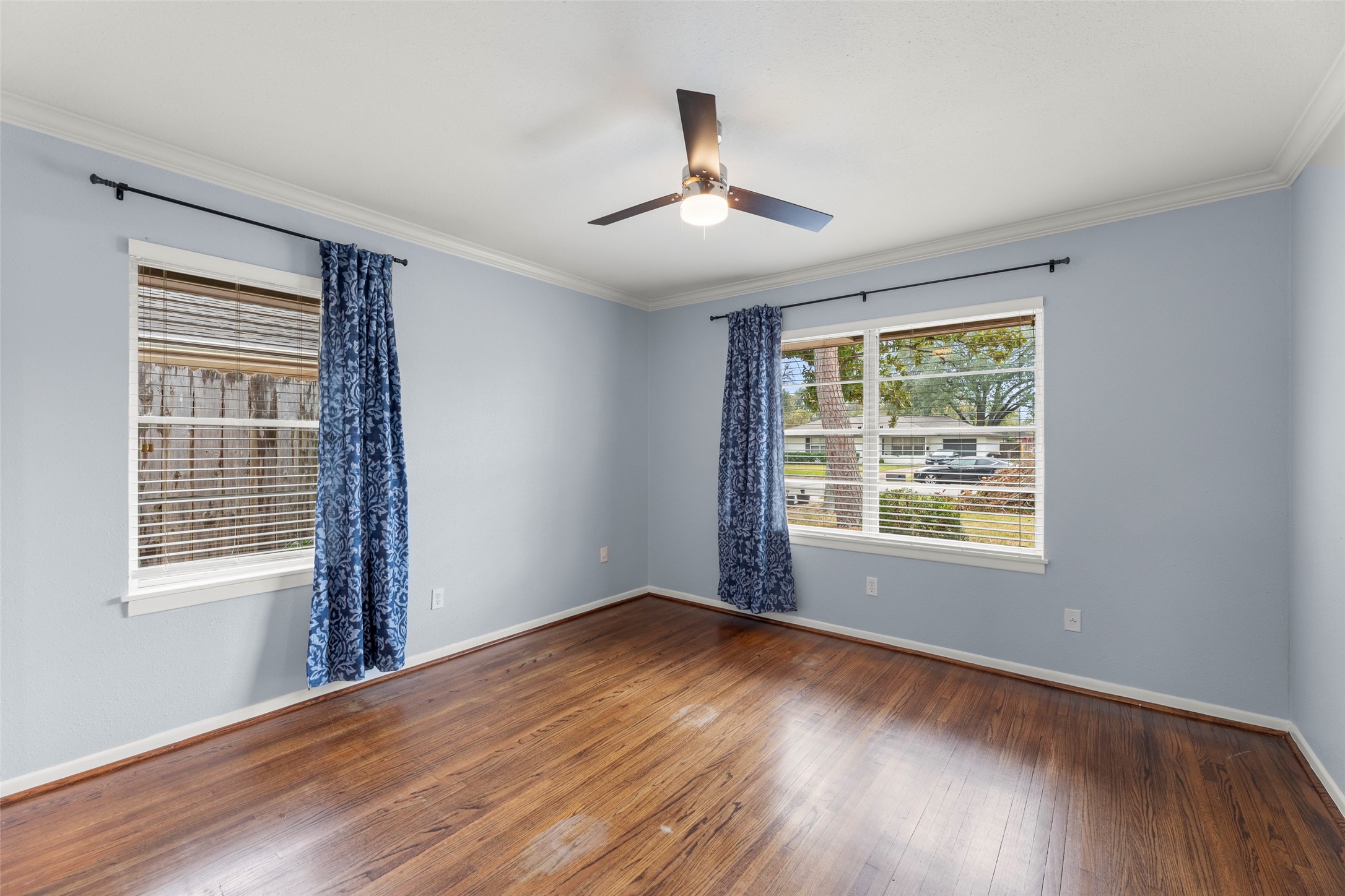 6148 Indigo Street Houston, TX 77074 - Photo 35 of 37 a view of an empty room with wooden floor and a window