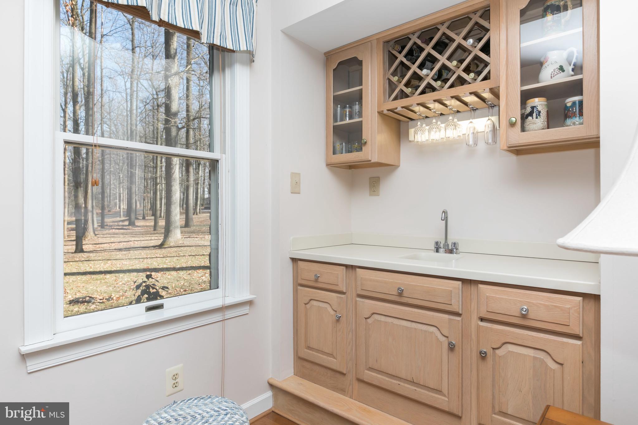 14110 Robcaste Road Phoenix, MD 21131 - Photo 7 of 28 Wonderful wine and wet bar in the family room