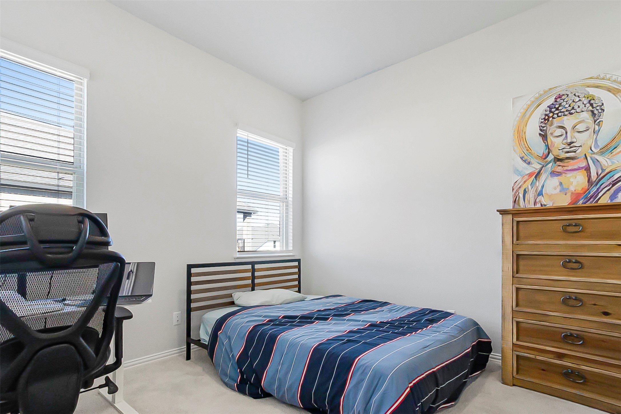 1016 Calendula Trail Georgetown, TX 78628 - Photo 26 of 40 Bedroom featuring light carpet