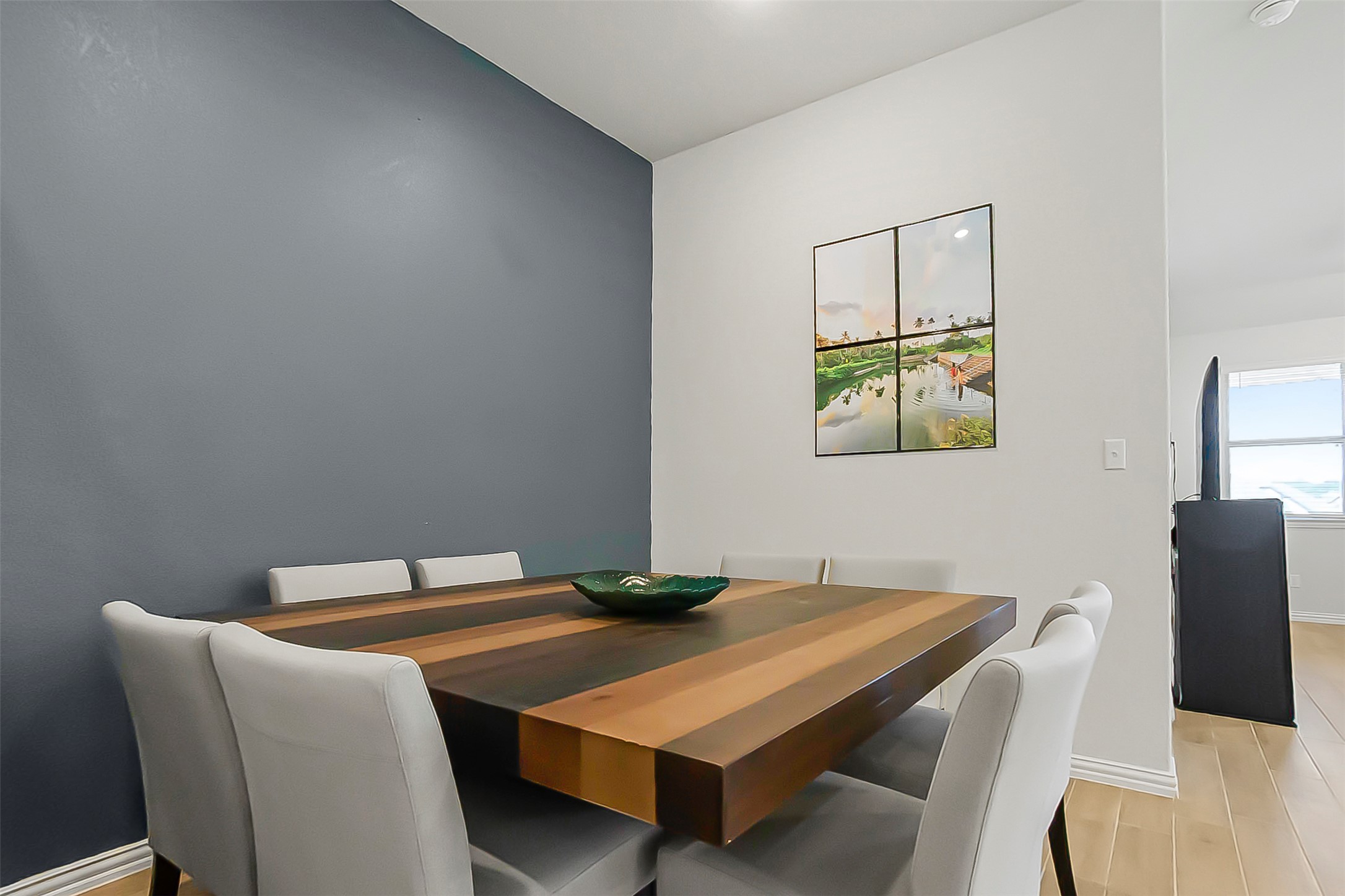 1016 Calendula Trail Georgetown, TX 78628 - Photo 34 of 40 Dining room featuring light wood finished floors and baseboards