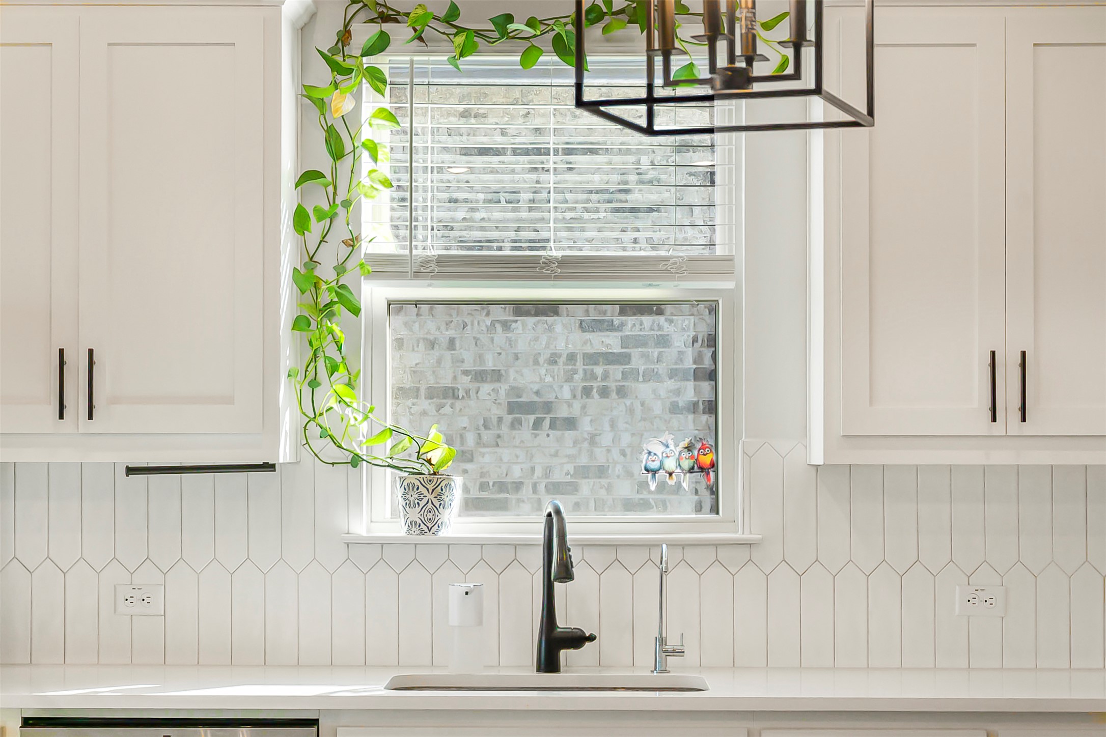 1016 Calendula Trail Georgetown, TX 78628 - Photo 9 of 40 Kitchen view of a sink and white cabinetry