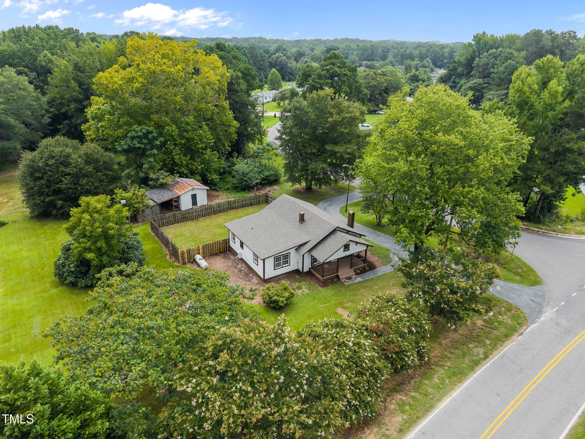 9900 Kennebec Church Road Angier, NC 27501 - Photo 1 of 41 an aerial view of a house with pool outdoor seating and yard