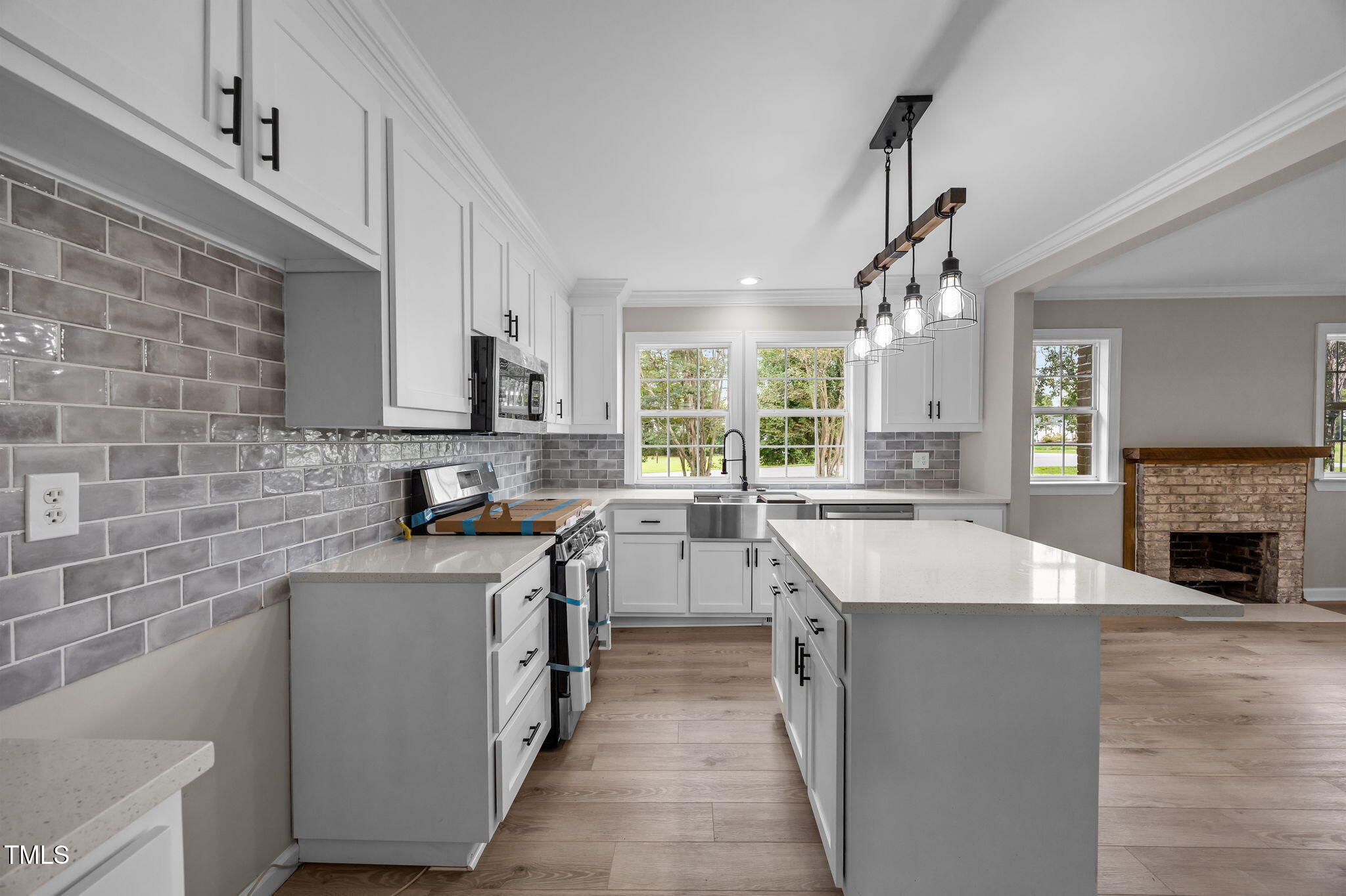 9900 Kennebec Church Road Angier, NC 27501 - Photo 11 of 41 a kitchen with a sink cabinets and window