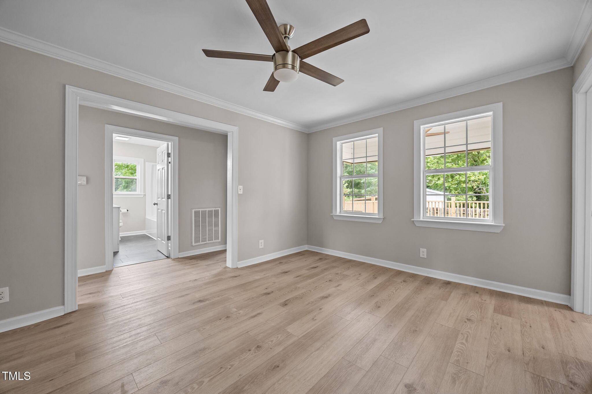 9900 Kennebec Church Road Angier, NC 27501 - Photo 16 of 41 wooden floor in an empty room with a window