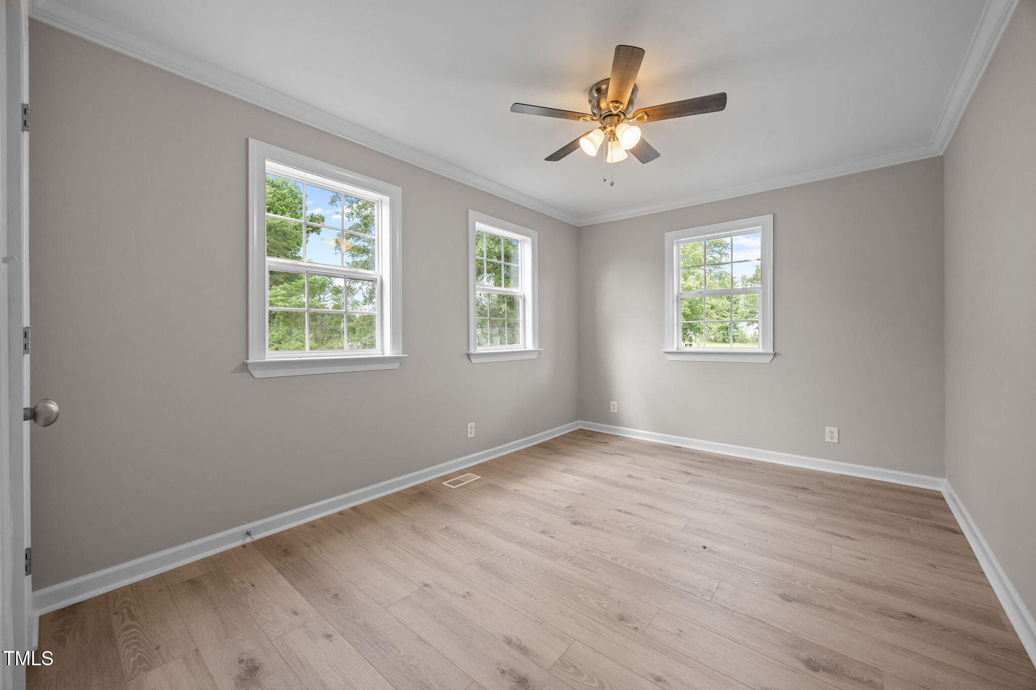 9900 Kennebec Church Road Angier, NC 27501 - Photo 18 of 41 a view of an empty room with a window and wooden floor