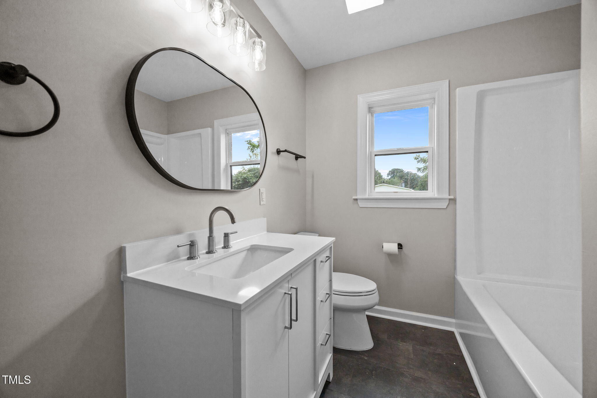 9900 Kennebec Church Road Angier, NC 27501 - Photo 25 of 41 a bathroom with a sink and a mirror
