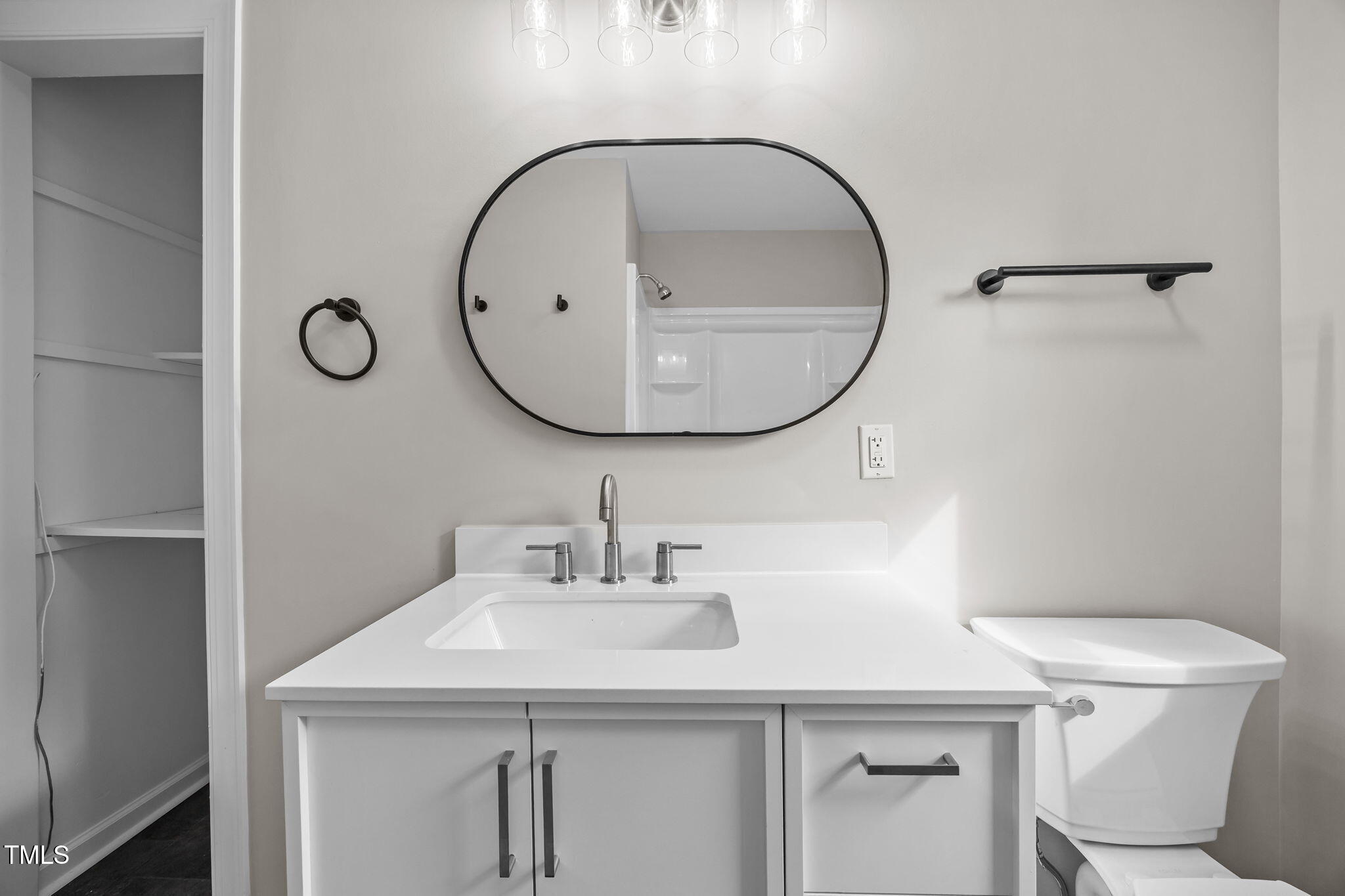 9900 Kennebec Church Road Angier, NC 27501 - Photo 26 of 41 a bathroom with a sink a toilet and a mirror