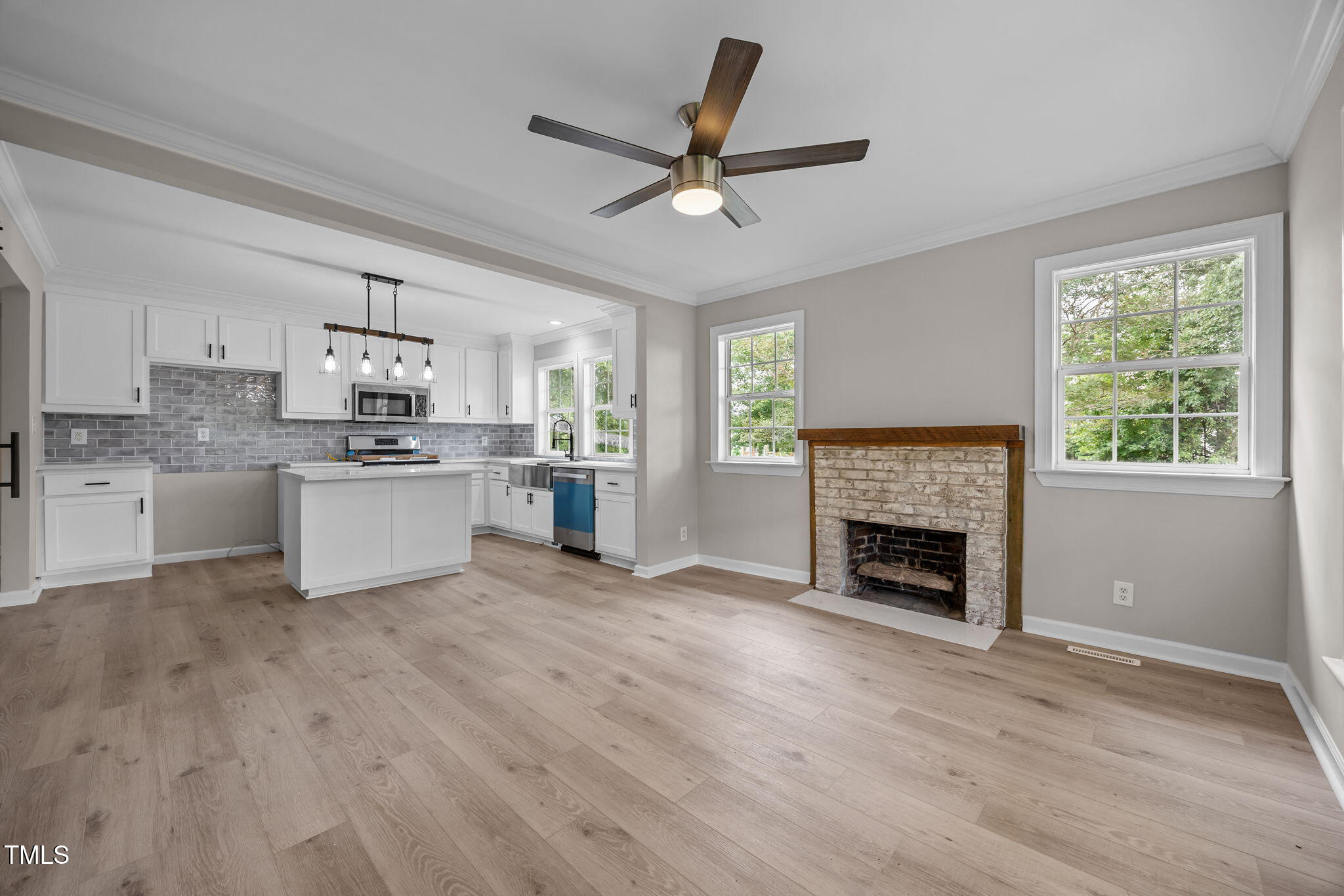 9900 Kennebec Church Road Angier, NC 27501 - Photo 3 of 41 a view of kitchen with granite countertop stove top oven and cabinets