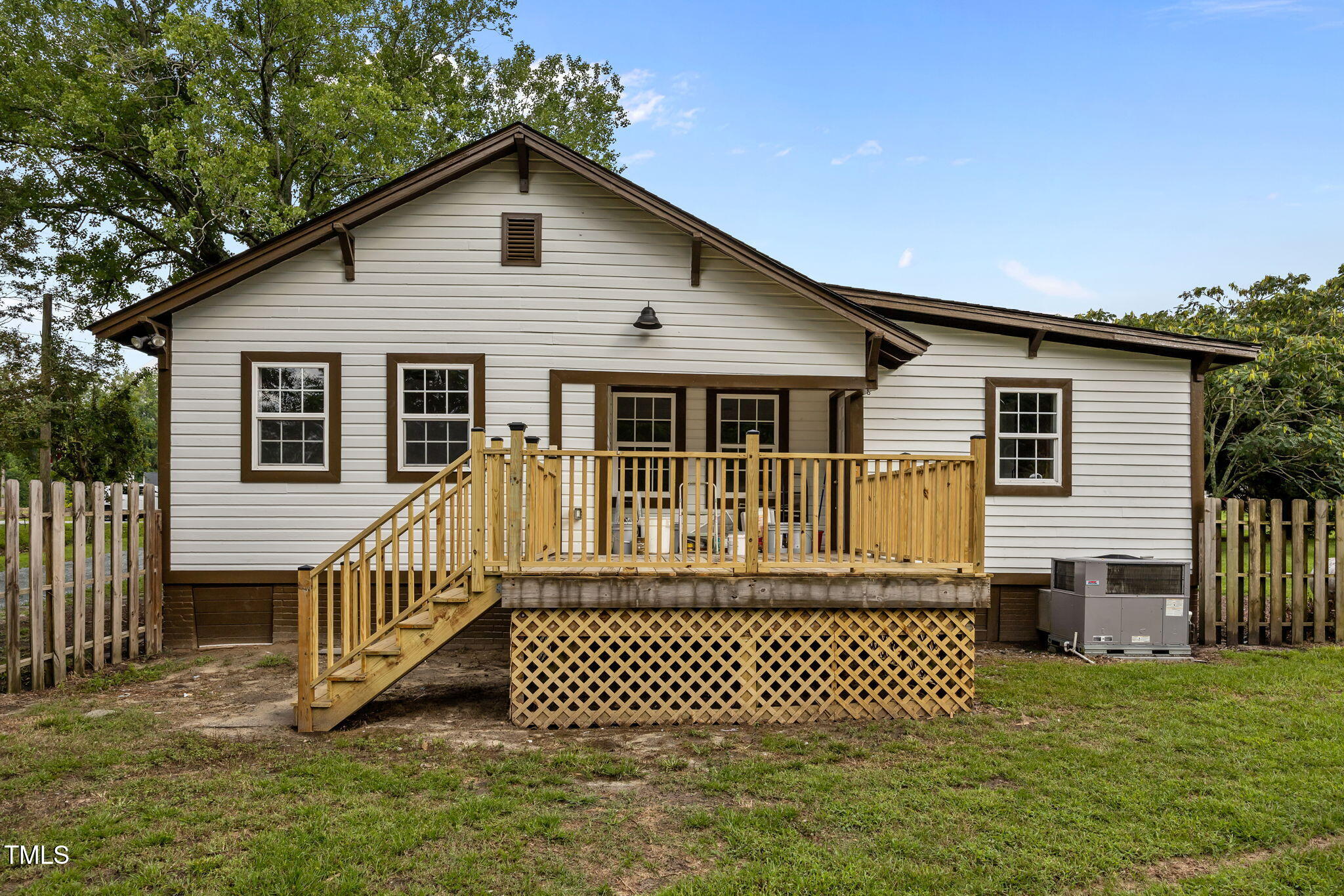 9900 Kennebec Church Road Angier, NC 27501 - Photo 31 of 41 a front view of a house with a garden