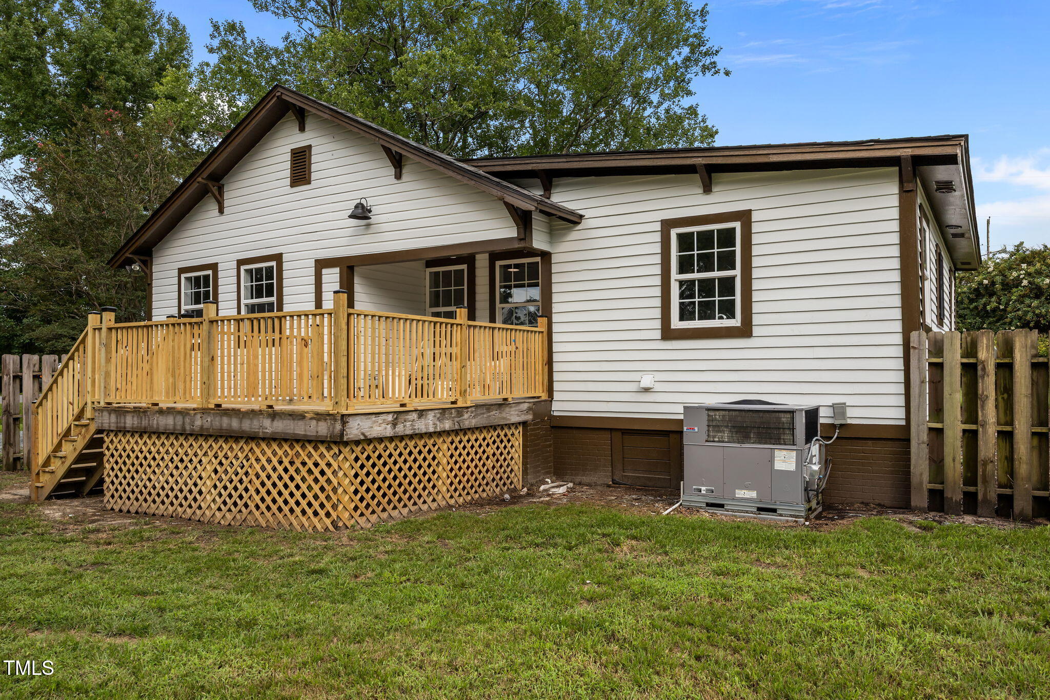 9900 Kennebec Church Road Angier, NC 27501 - Photo 34 of 41 a front view of a house with a garden