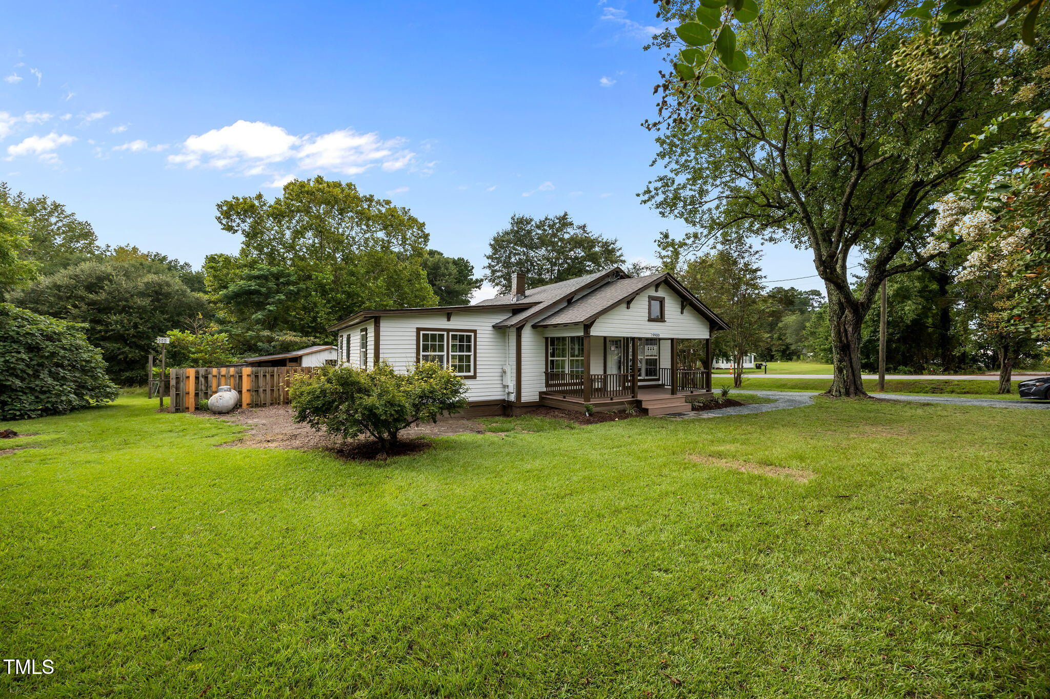 9900 Kennebec Church Road Angier, NC 27501 - Photo 38 of 41 a front view of a house with garden