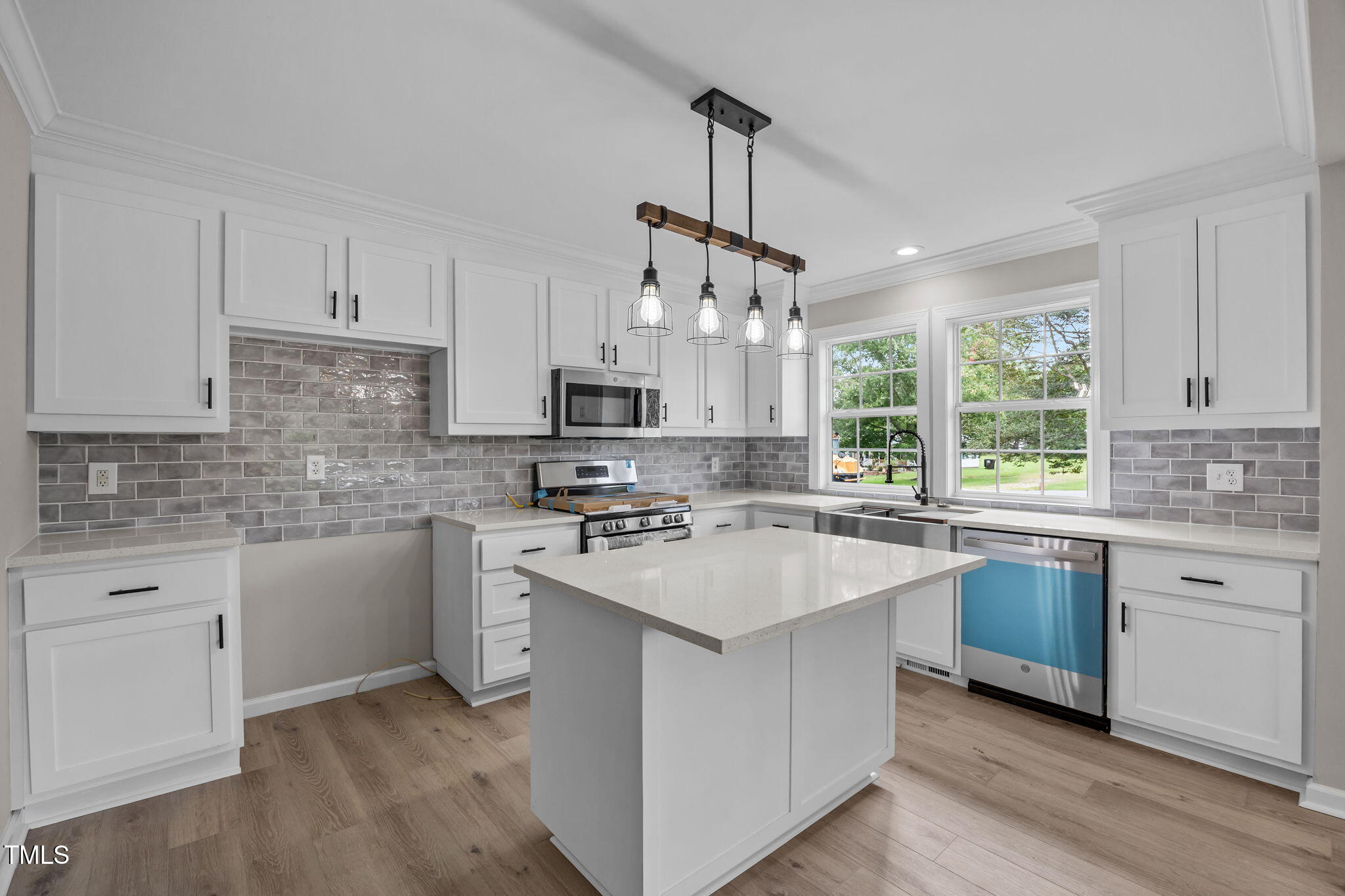 9900 Kennebec Church Road Angier, NC 27501 - Photo 7 of 41 a kitchen with appliances cabinets and a sink