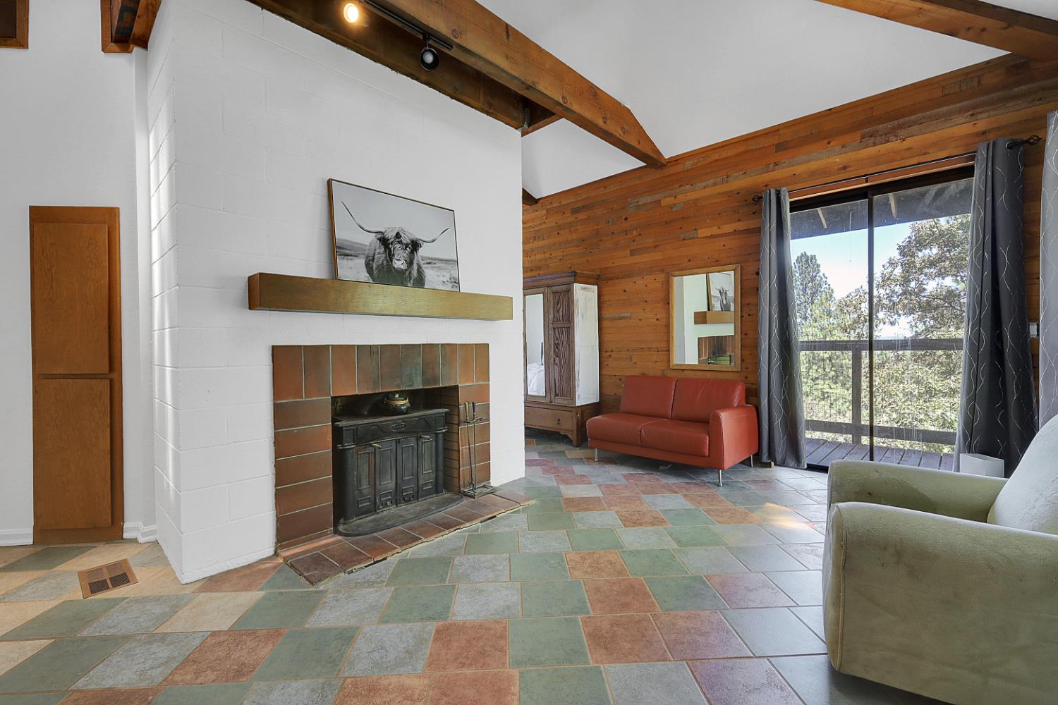 9490 Ranger Trail Oregon House, CA 95962 - Photo 28 of 90 Upper level Living room, wood burning stove and outside deck area.