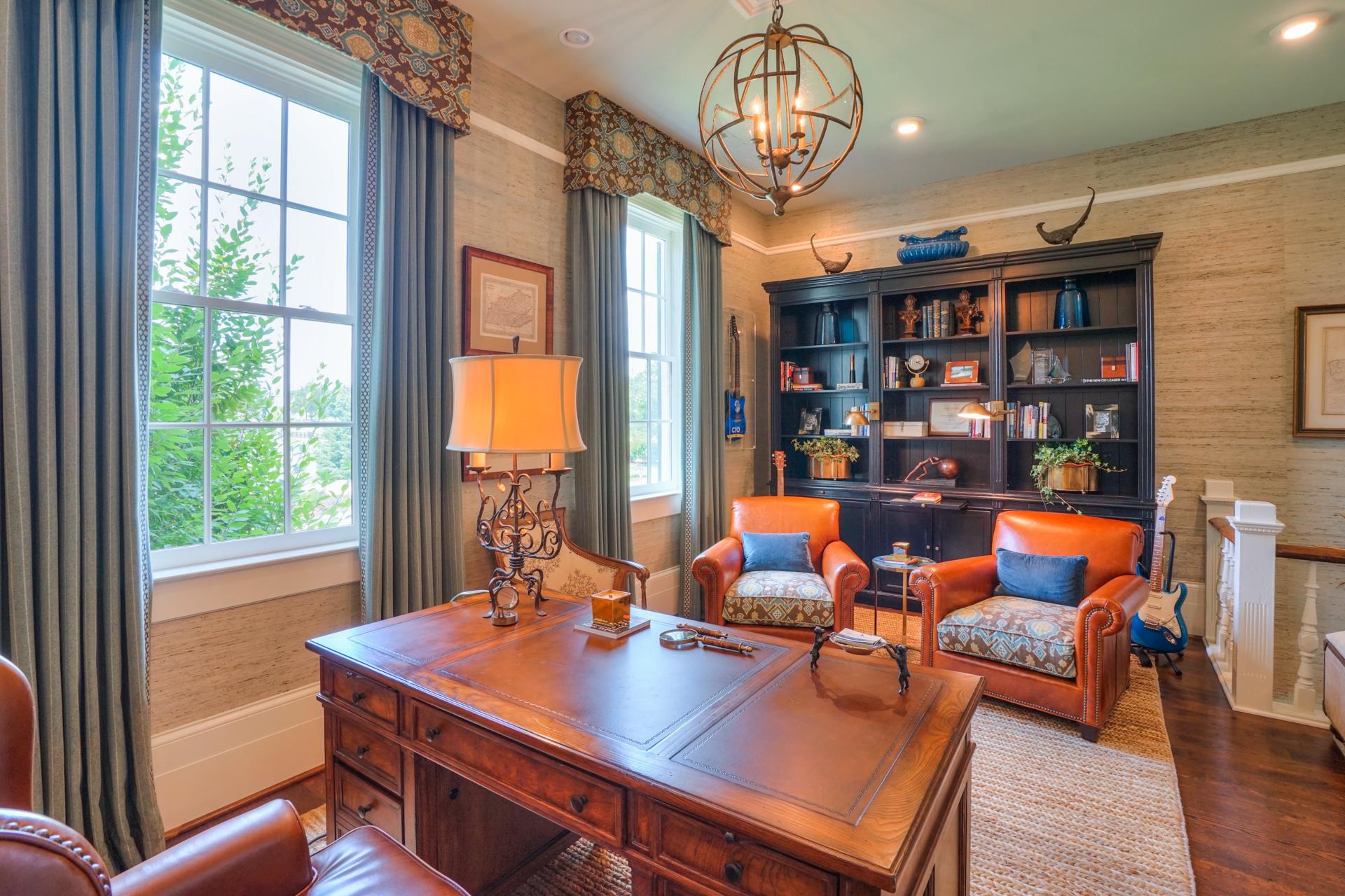 8483 Taliaferro Road Eagleville, TN 37060 - Photo 12 of 30 a view of a dining room with furniture window and wooden floor