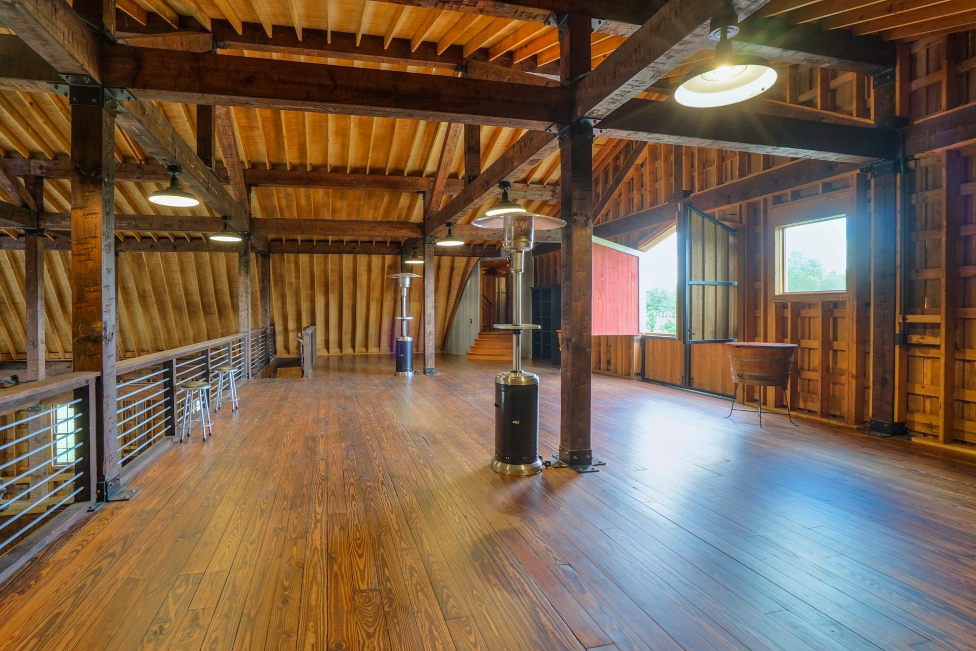 8483 Taliaferro Road Eagleville, TN 37060 - Photo 28 of 30 a view of a porch with wooden floor and stairs