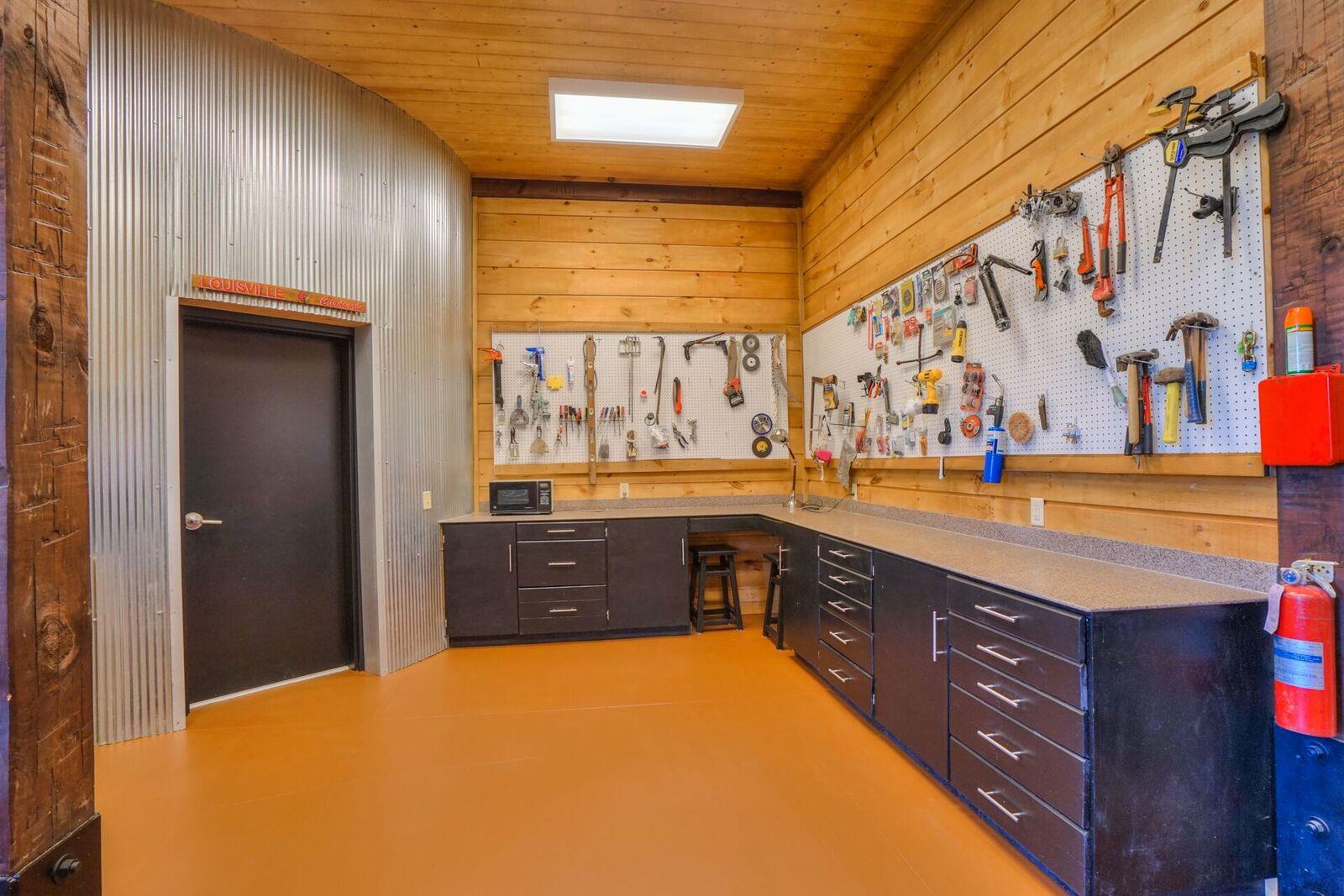 8483 Taliaferro Road Eagleville, TN 37060 - Photo 29 of 30 a spacious bathroom with a granite countertop sink and a bathtub