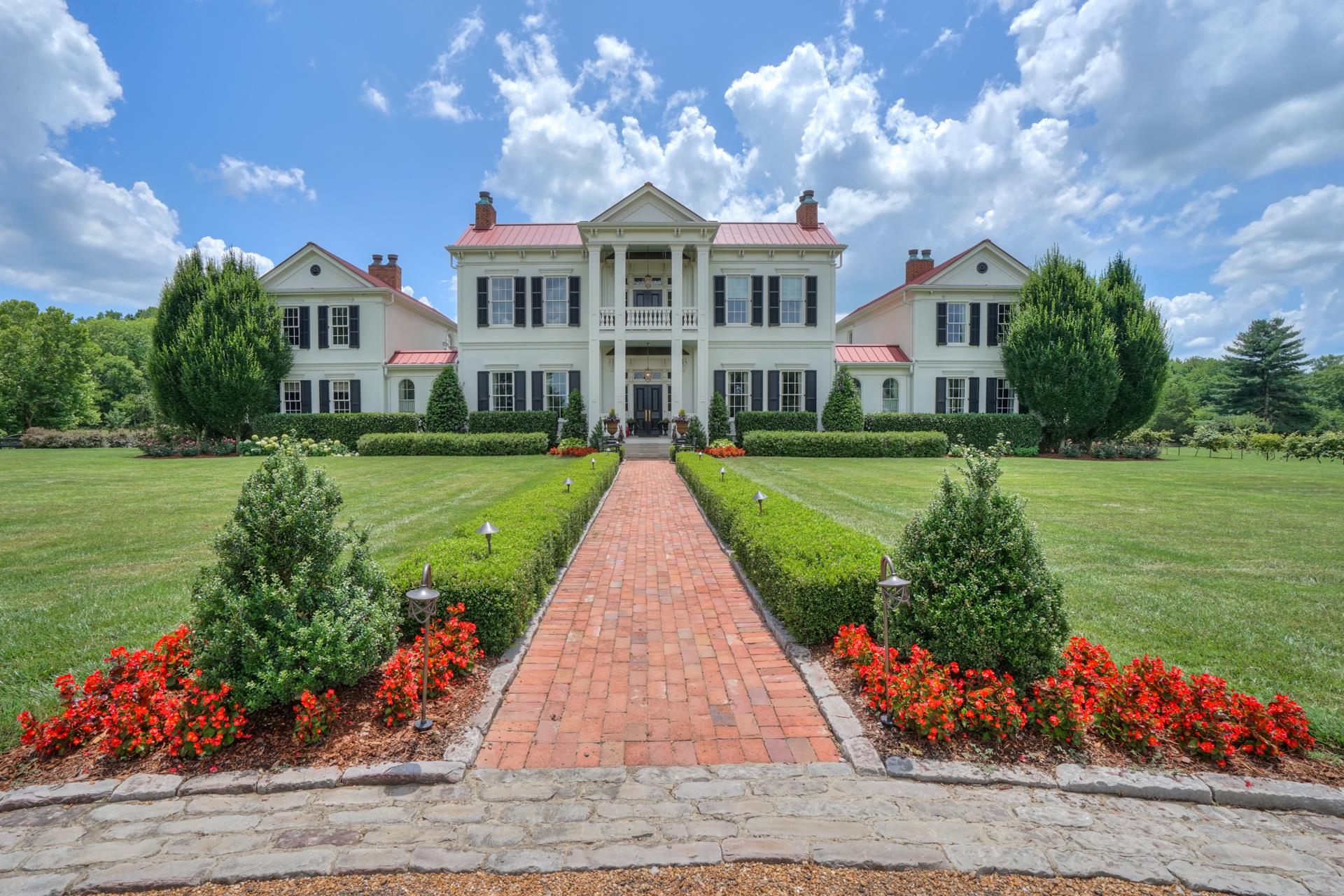 8483 Taliaferro Road Eagleville, TN 37060 - Photo 3 of 30 a front view of a house with a garden