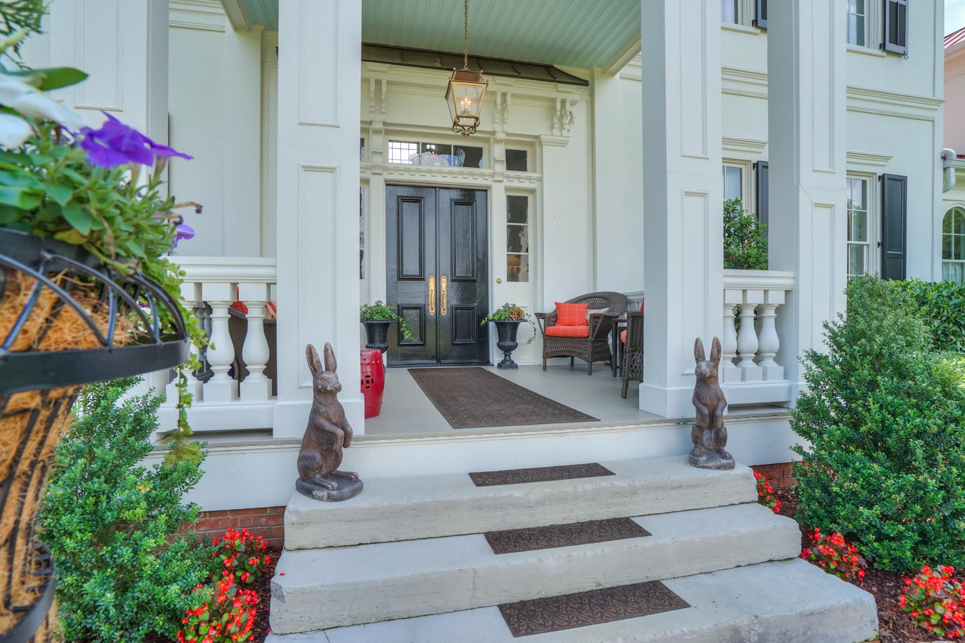 8483 Taliaferro Road Eagleville, TN 37060 - Photo 4 of 30 a view of tall buildings with flower pots