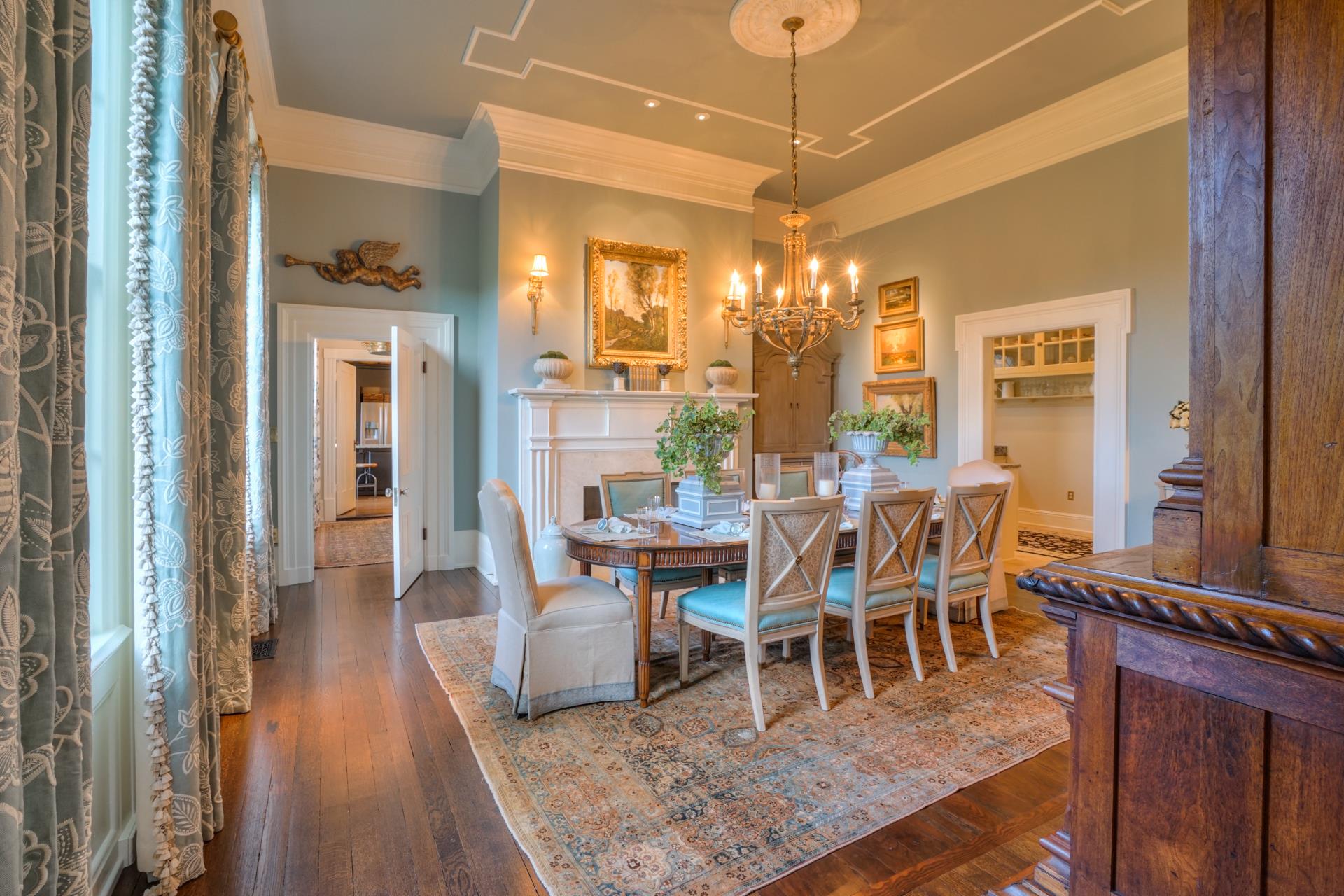 8483 Taliaferro Road Eagleville, TN 37060 - Photo 7 of 30 a view of a dining room with furniture and wooden floor