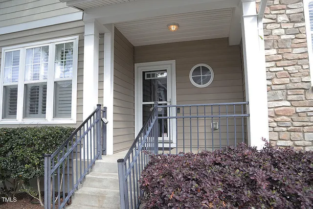 a view of a house with a porch