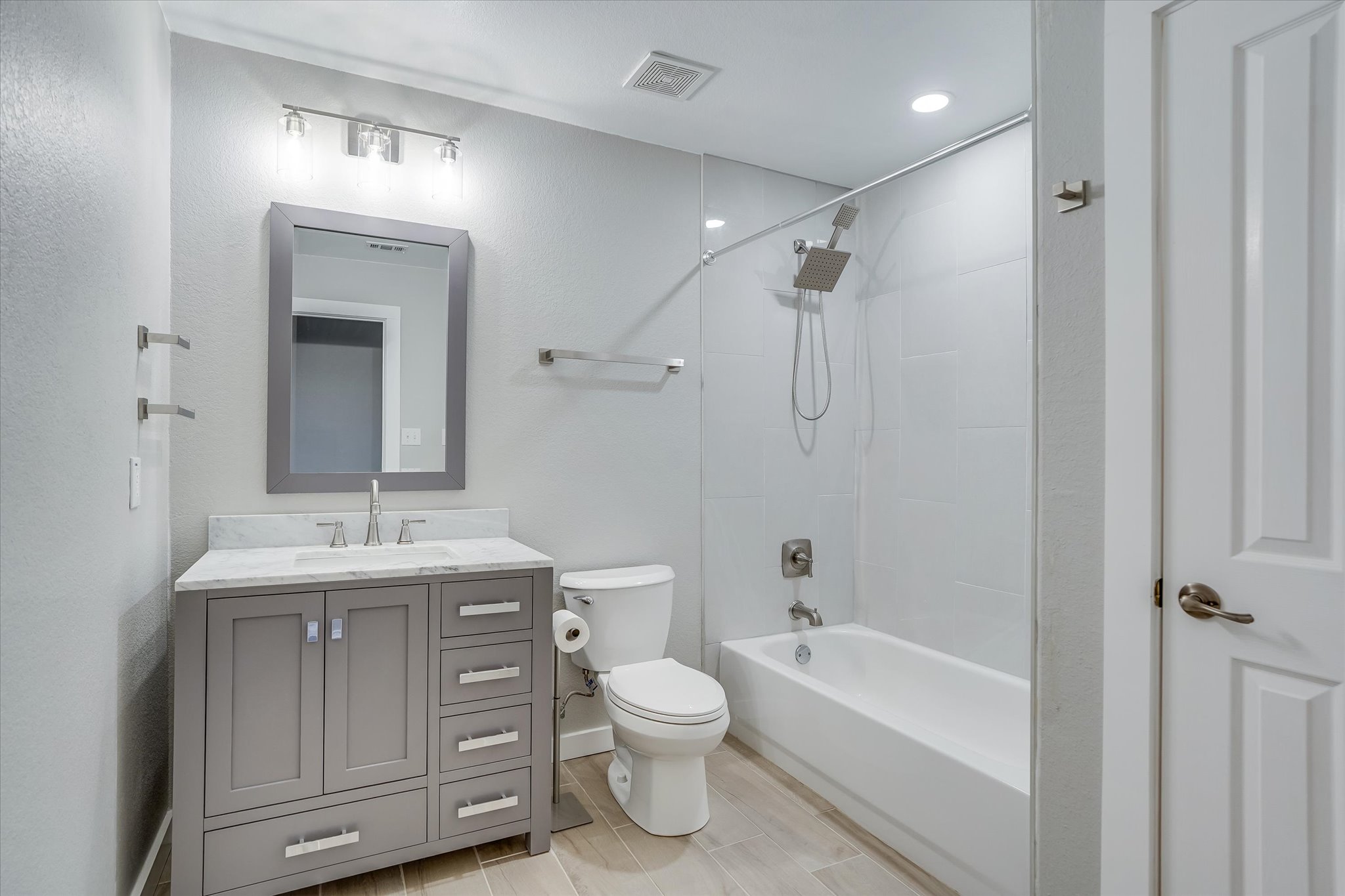 1400 Tom Sawyer Road Austin, TX 78737 - Photo 24 of 40 Secondary bath updated with new vanity and lighting (2025).