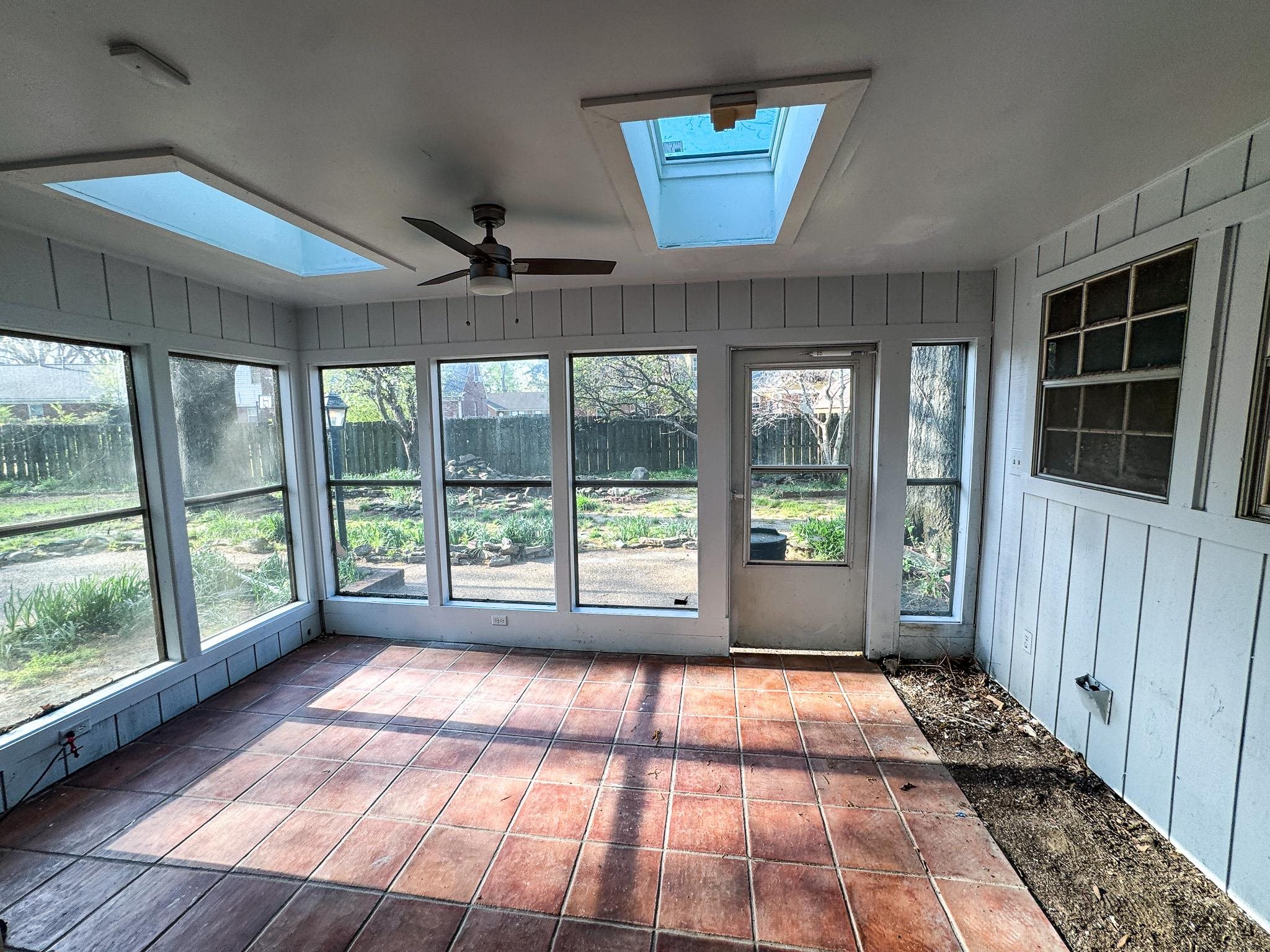 1345 Hickory Ridge Cove Memphis, TN 38116 - Photo 22 of 26 a view of empty room with wooden floor and fan