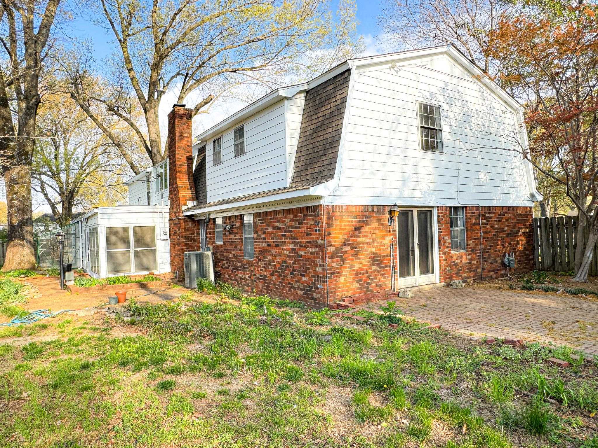 1345 Hickory Ridge Cove Memphis, TN 38116 - Photo 24 of 26 a view of a yard with a house