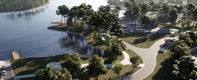 an aerial view of a house with yard swimming pool and outdoor seating