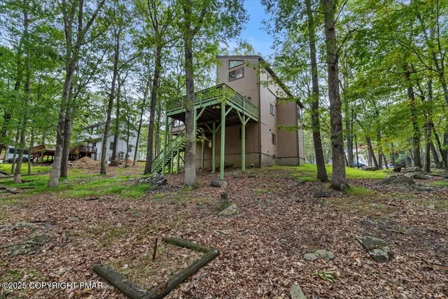 a view of a yard with an outdoor space