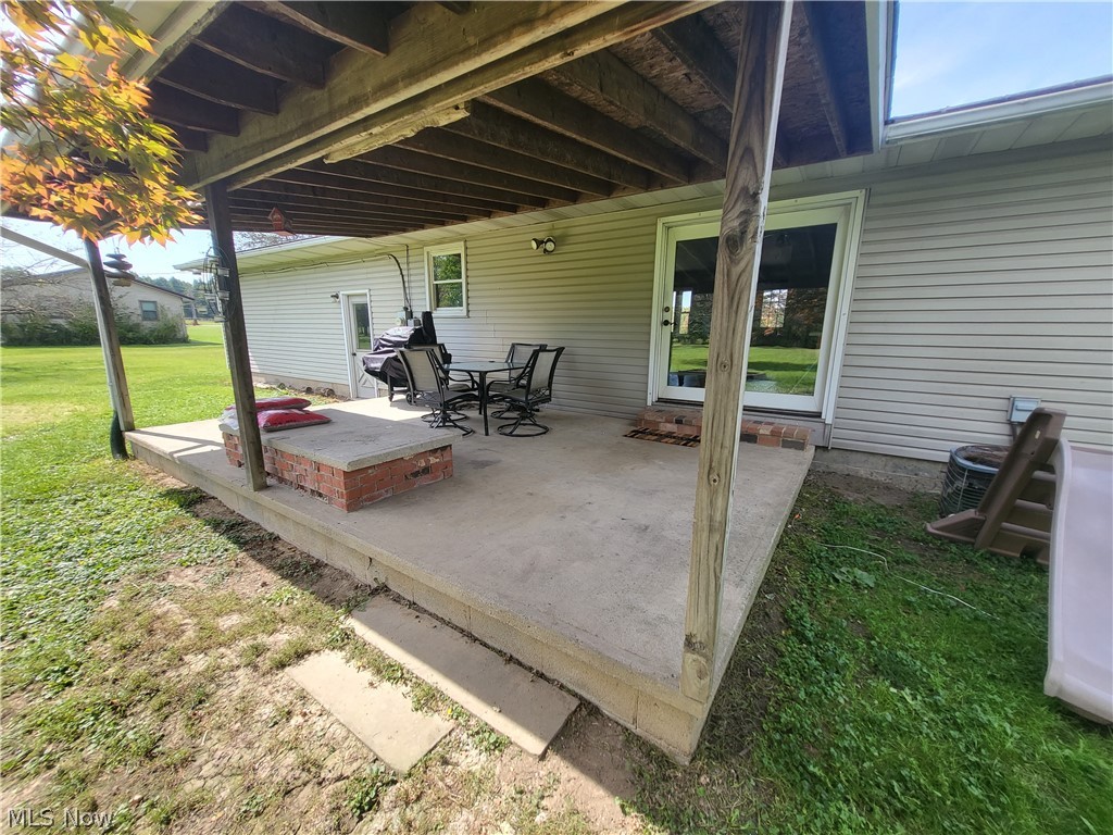 8383 Pawnee Road Lodi, OH 44254 - Photo 31 of 35 Back porch with cover.