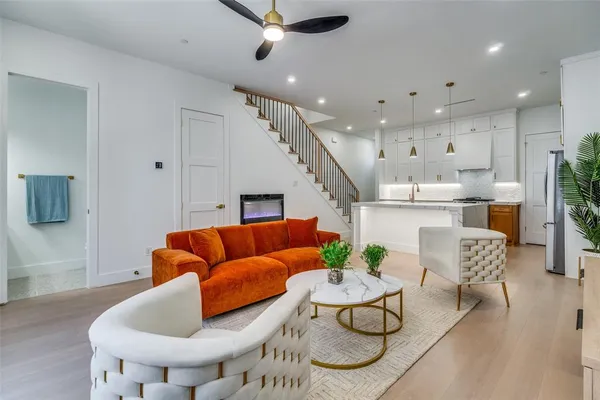 a bedroom with a bed and a night stand