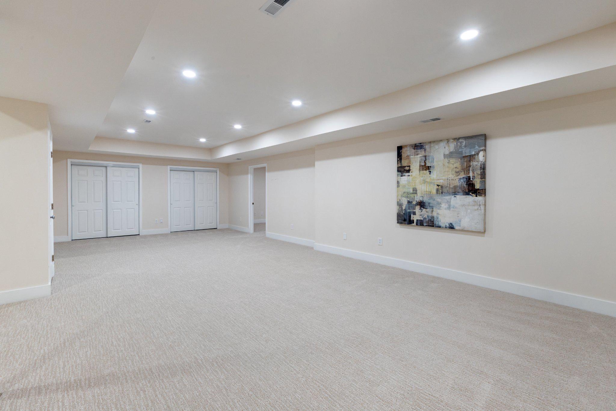 7009 Persimmon Tree Road Bethesda, MD 20817 - Photo 40 of 63 Lower Level Recreation Room (33' x 20' approx.)