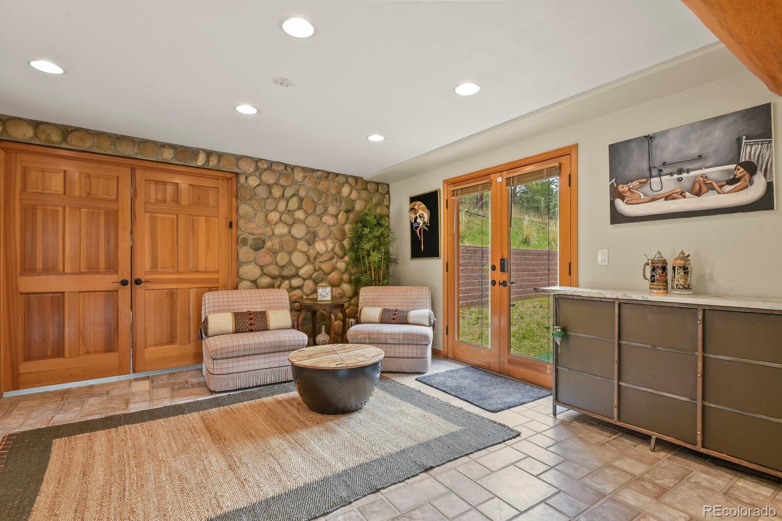 417 Witter Gulch Road Evergreen, CO 80439 - Photo 21 of 50 a living room with furniture