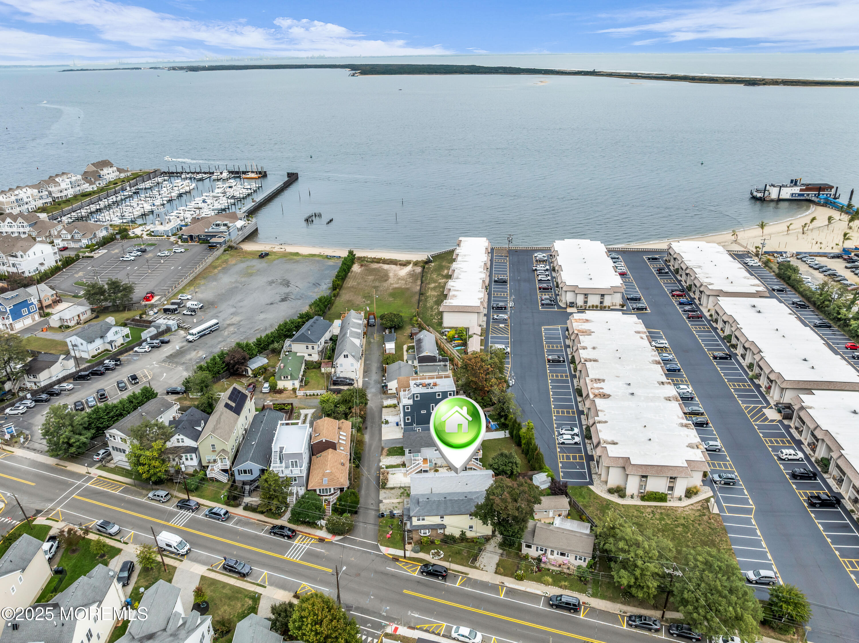 51 Matthew Street Highlands, NJ 07732 - Photo 3 of 19 an aerial view of a residential building ocean and mountain view in back