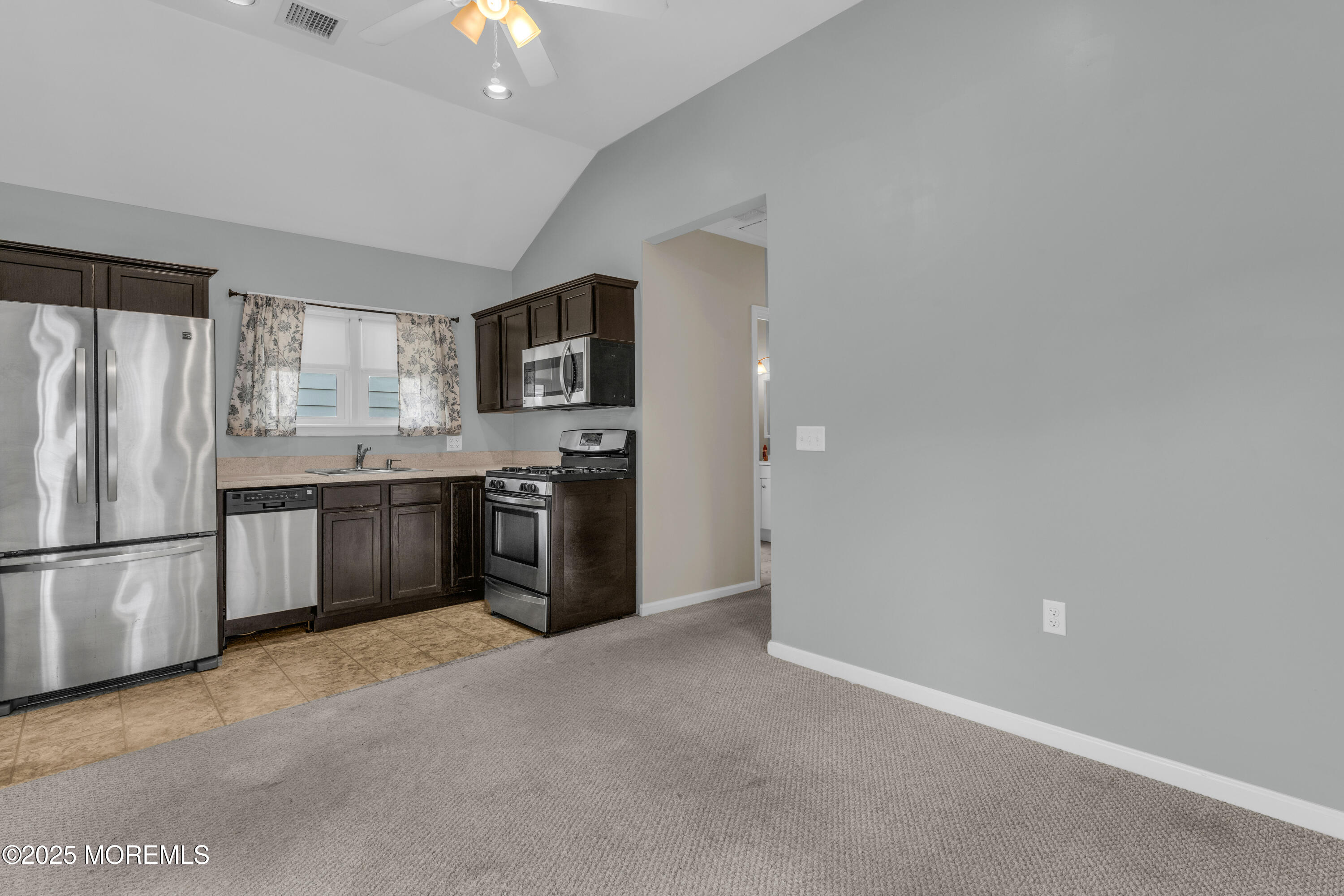 51 Matthew Street Highlands, NJ 07732 - Photo 9 of 19 a kitchen with stainless steel appliances a refrigerator sink and stove