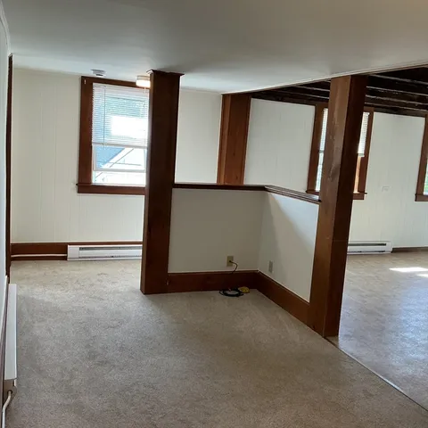 a view of a room with rack on the wall