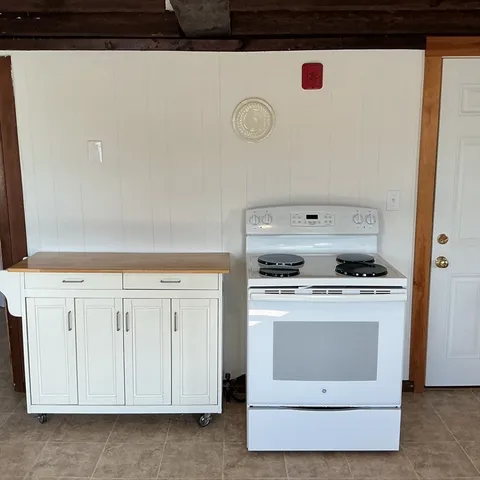 a view of a kitchen with washer and dryer