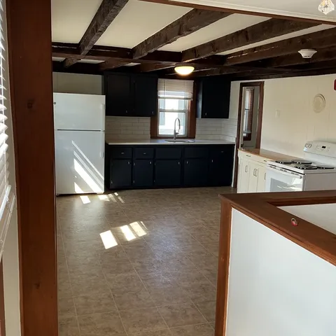 a bathroom with a sink and toilet
