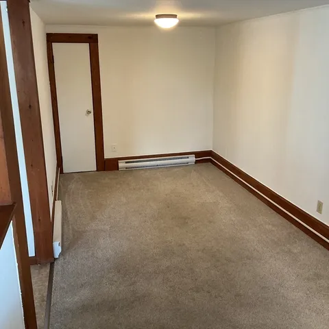 an empty room with closet