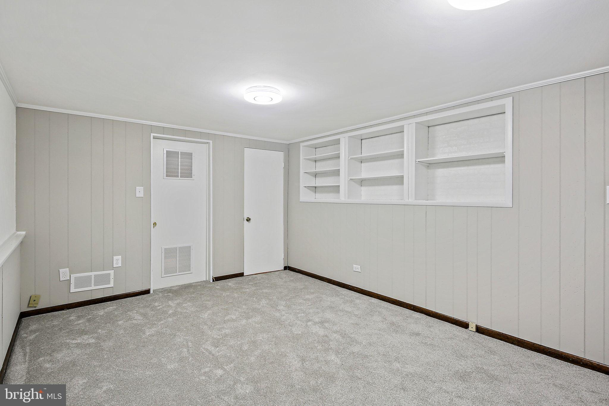 6204 Scranton Road Baltimore, MD 21237 - Photo 20 of 31 a view of an empty room with a window