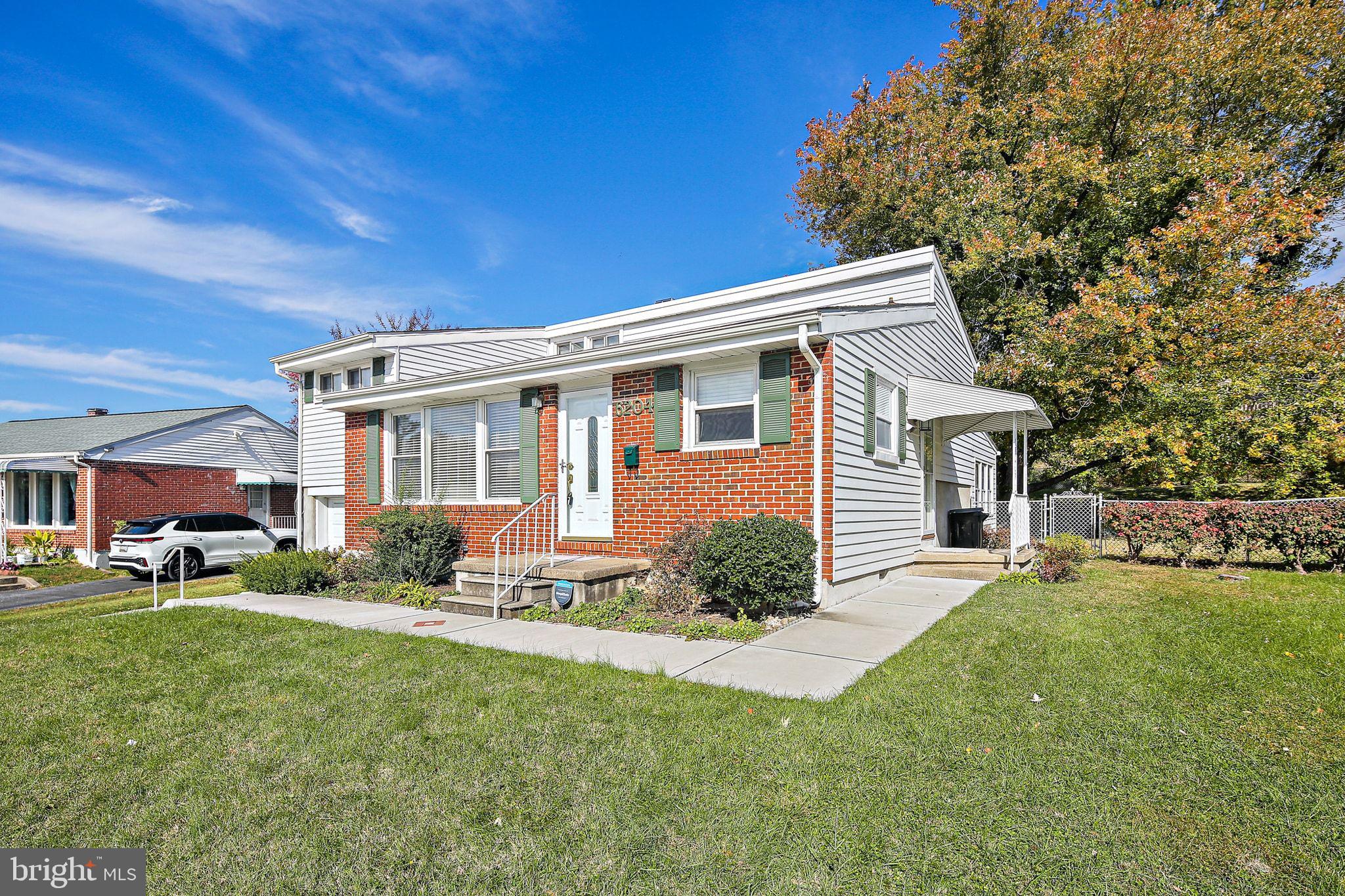 6204 Scranton Road Baltimore, MD 21237 - Photo 2 of 31 a front view of house with yard and green space