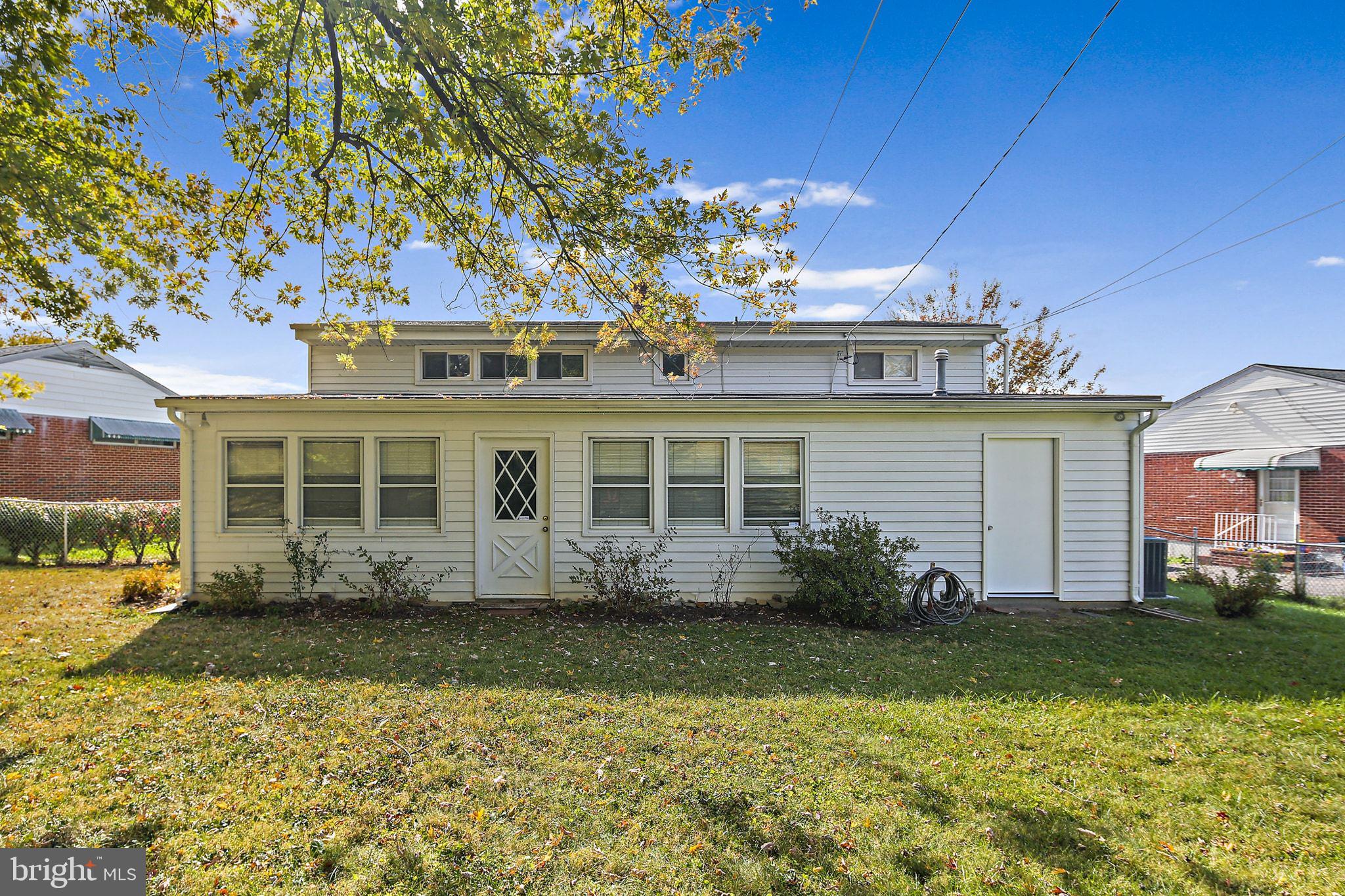 6204 Scranton Road Baltimore, MD 21237 - Photo 27 of 31 front view of a house with a yard