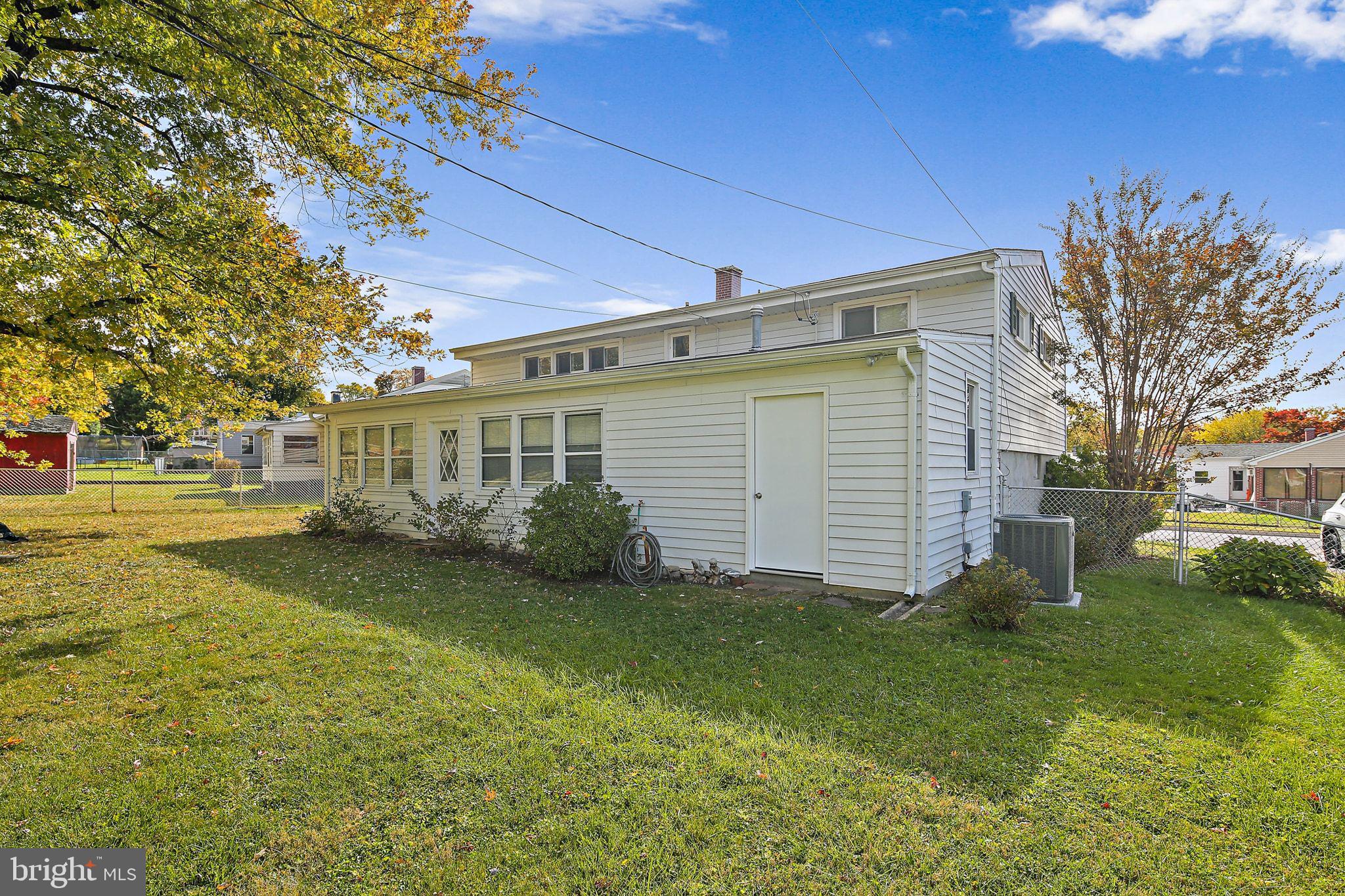 6204 Scranton Road Baltimore, MD 21237 - Photo 29 of 31 a front view of a house with garden