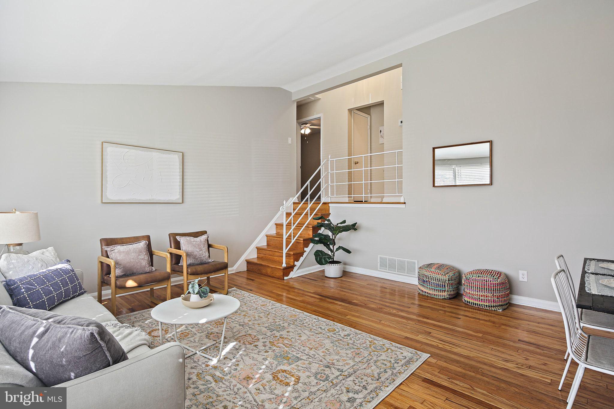 6204 Scranton Road Baltimore, MD 21237 - Photo 3 of 31 a living room with furniture and a wooden floor