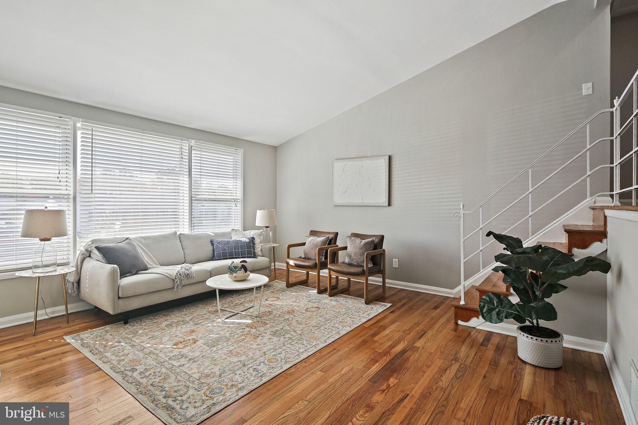 6204 Scranton Road Baltimore, MD 21237 - Photo 4 of 31 a living room with furniture and a wooden floor