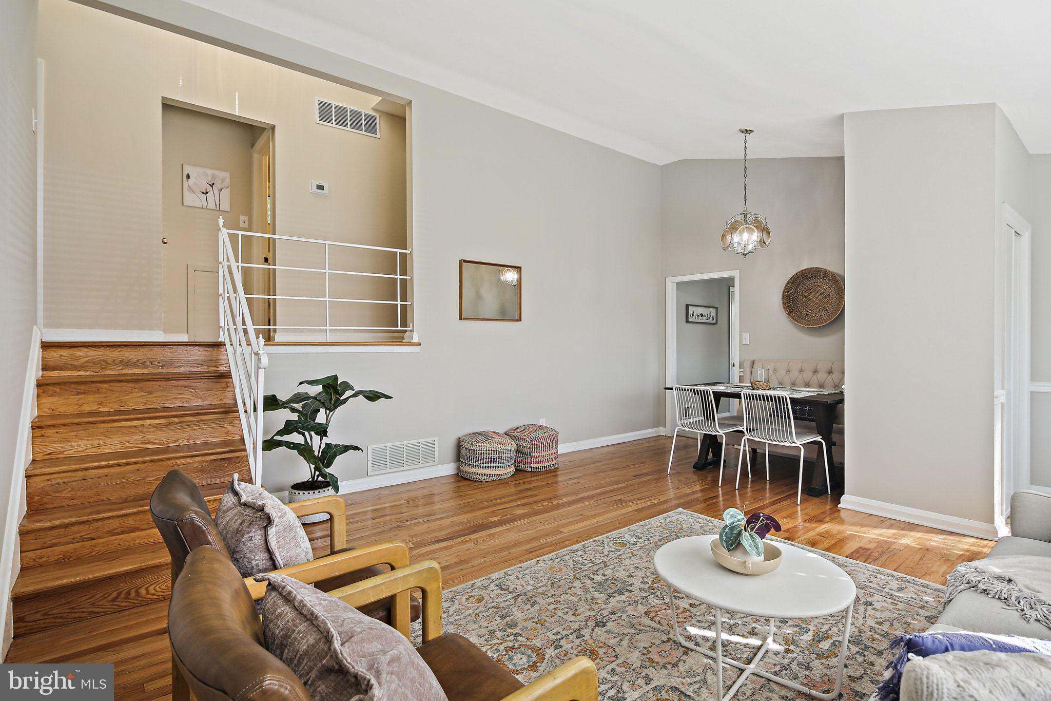 6204 Scranton Road Baltimore, MD 21237 - Photo 6 of 31 a dining room with furniture and wooden floor