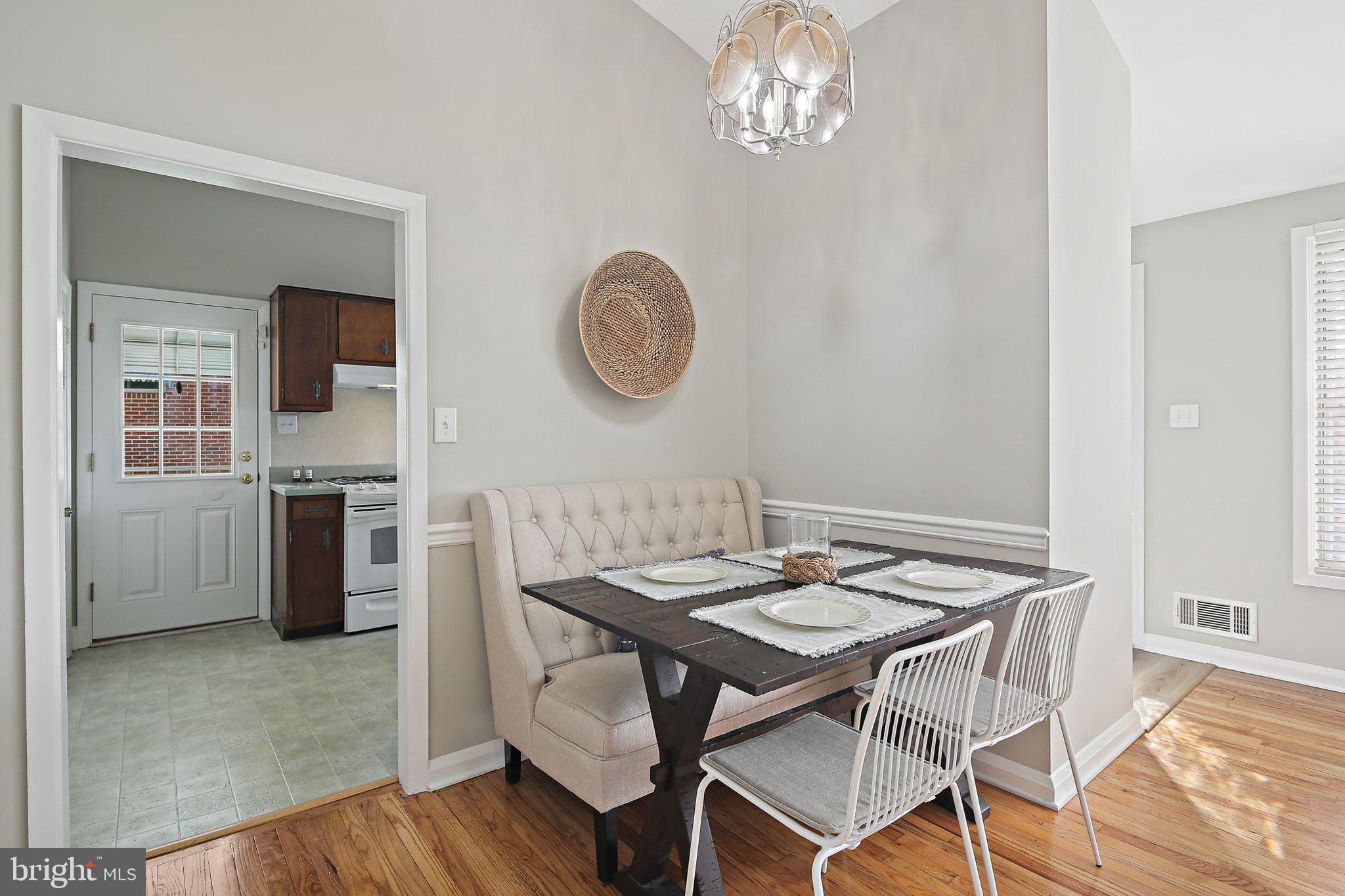 6204 Scranton Road Baltimore, MD 21237 - Photo 7 of 31 a view of a dining room with furniture