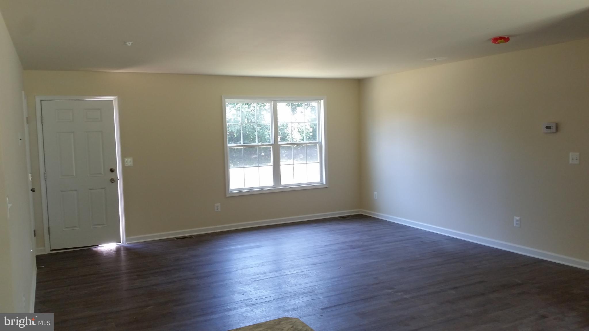 913 Round Top Road Chestertown, MD 21620 - Photo 7 of 12 LIVING ROOM W WOOD LAMINATE FLOORING