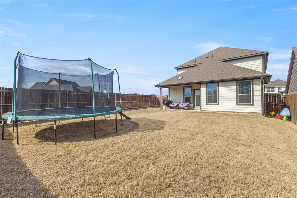 551 Ruthye Lane Pilot Point, TX 76258 - Photo 33 of 40 a view of house with a swimming pool