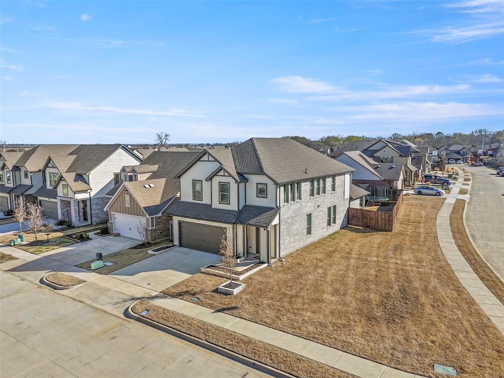 551 Ruthye Lane Pilot Point, TX 76258 - Photo 35 of 40 an aerial view of a house with a big yard